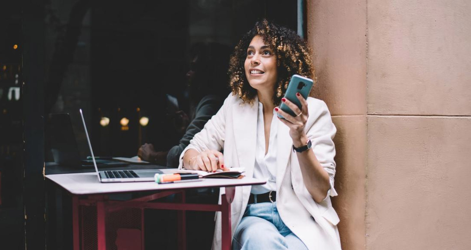 Woman at cafe on phone